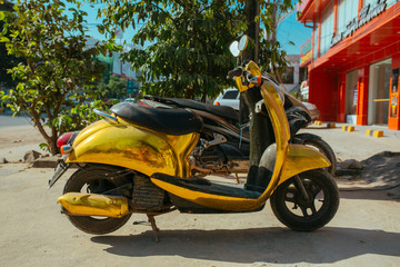 Naklejka na ściany i meble Motorbike, scooter, traditional two wheels transport in Asia