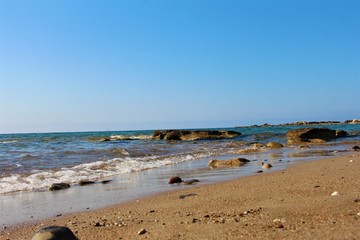 sea background, beach with rocks