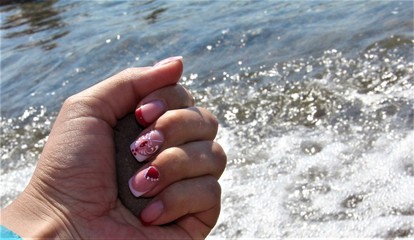 manicure on the background of the sea