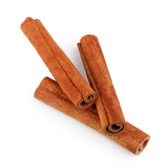 Cinnamon sticks isolated on white background. Top view
