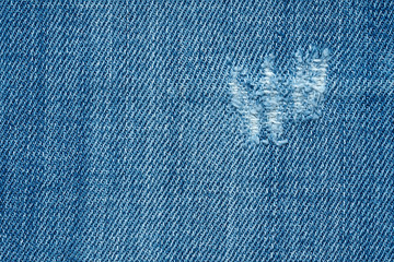 Blue texture background, jeans texture, fabric. Denim jeans background.