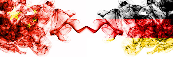 China, Chinese vs Germany, German smoky mystic states flags placed side by side. Concept and idea...