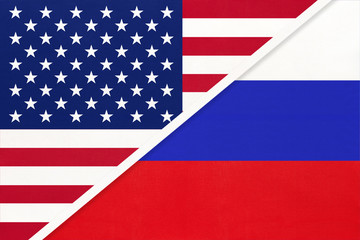 USA vs Russia national flag from textile. Relationship between american and european countries.