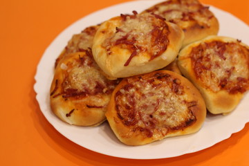 homemade pizza on orange background