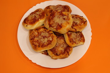 homemade pizza on orange background