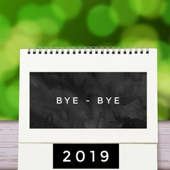 New Year's card. Green Background with Calendar Concept and text Bye bye 2019.