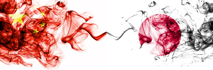 China, Chinese vs Japan, Japanese smoky mystic states flags placed side by side. Concept and idea thick colored silky abstract smoke flags