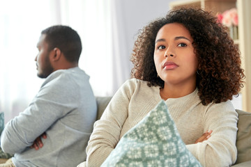 relationship difficulties, conflict and people concept - unhappy african american couple having...
