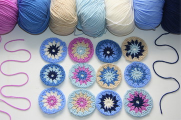 Crochet. Elements of knitting a plaid. Round napkins. Colored yarn. Knitting. Handwork.