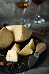 Cheese with nuts on the table, delicious snack