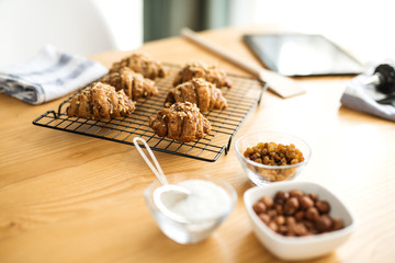 Baked cakes that are served on a table in the bun
