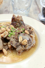 fried lamb and white beans