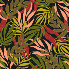 Summer seamless tropical pattern with bright red and green plants and leaves on a dark background. Beautiful seamless vector floral pattern. Printing and textiles.  Vintage pattern.