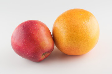 Apples and Orange Isolated on a White Background