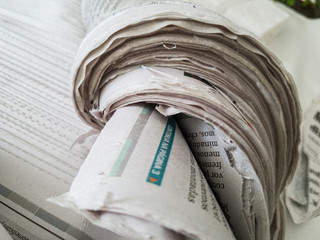 Pile of newspapers, detail of the pages.