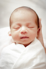 Portrait of cute Asian baby, concept create newborn, selective focus at the eyes.