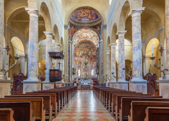 Fototapeta na wymiar REGGIO EMILIA, ITALY - APRIL 12, 2018: The church Basilica di San Prospero with the Last Judgment fresco in main apsida of by Camillo Procaccini (1585 - 1587).