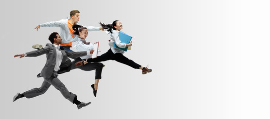 Fototapeta na wymiar Happy office workers jumping and dancing in casual clothes or suit with folders on white. Ballet dancers. Business, start-up, working open-space, motion and action concept. Creative collage. Copyspace