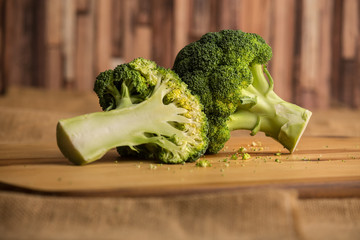  cut broccoli on a wooden board