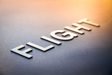 Word flight written with white solid letters