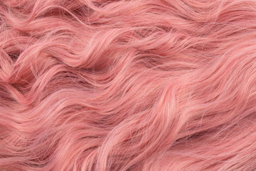 Naklejka premium Pink wavy hair pattern. Top view.