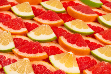 Pomelo and grapefruit slices background.