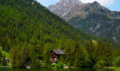 Fototapeta premium Great view of mountain ranges above lake Champex-Lac. Picturesque scene. Popular tourist attraction. Location place Swiss alps, Europe. Beauty world.
