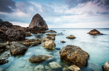 Majestic Black sea and huge stone blocks in the bay. Location place Crimea peninsula, Ukraine, Europe.