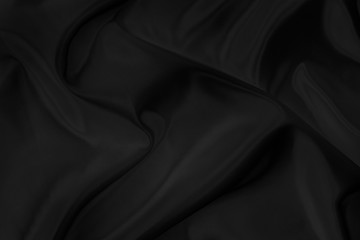 Obraz premium Black gray satin dark fabric texture luxurious shiny that is abstract silk cloth background with patterns soft waves blur beautiful.