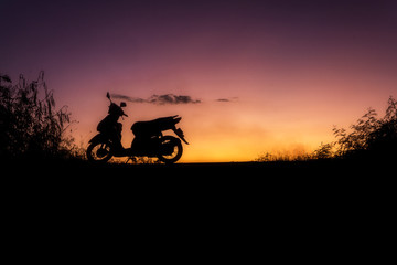 Fototapeta na wymiar silhouette of a motobike