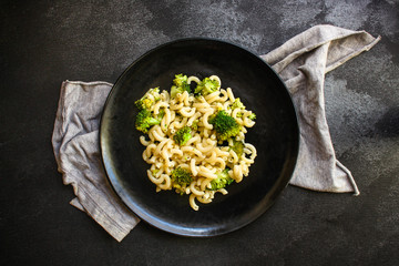 pasta broccoli, vegetarian dish (main course with vegetables Cavatappi, Elbow) menu concept. food background. top view. copy space