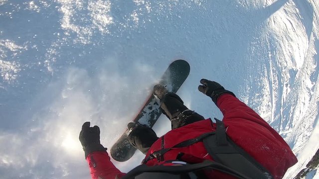 snowboarder slopes down hill.Shadow of snowboarder. FIRST PERSON VIEW- Jasna-Slovakia