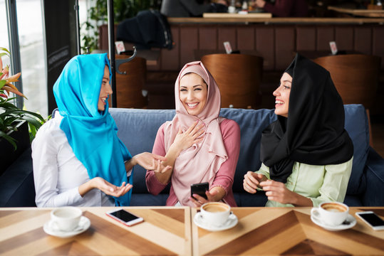 Young muslim woman in the restaurant