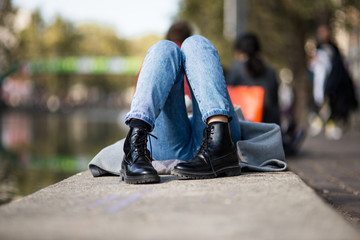 man sitting on a bench in the park