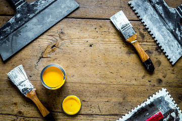building implements set for repair on wooden background top view mock up