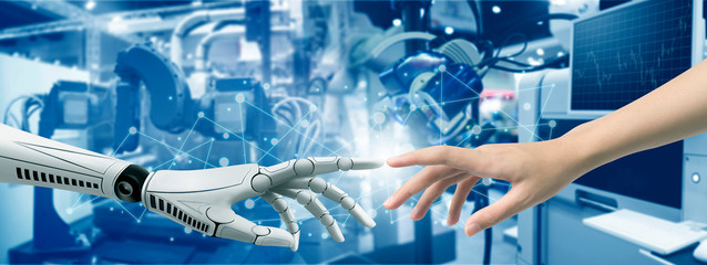 Technology industrial revolution hand robot Imitate learning by hand human on background robot industrial.