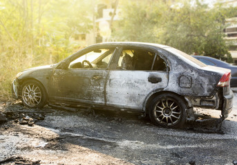 Fototapeta na wymiar Burned abandoned car