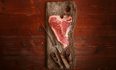 raw tbone steak for blessing day and christmas holidays. A piece of fresh organic farm meat
