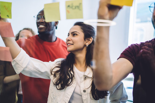 Young students creating plan of project