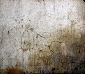 white dirty and damaged old wall - rough texture background