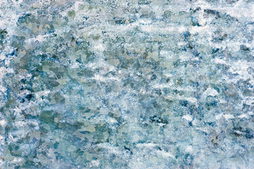 Zinc texture. The surface of the wall of the house is made of old galvanized sheet. Abstract background texture for design and decoration.