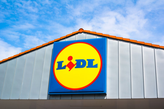LIDL MARKET, BOHUMIN, CZECH REPUBLIC, EUROPE - MAY 8, 2017: Logo of Lidl company on the gable wall. Logo is inviting people into the shop / supermarket / store 