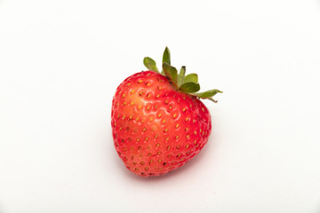 Ripe strawberries on a white background.Close up.