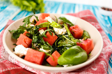 salad with watermelon, feta cheese and arugula