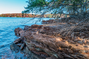 Fototapeta na wymiar Rocky cliff at the lake