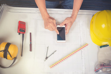 architect working on blueprints