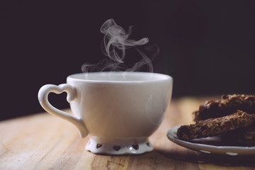 Morning coffe with oatmeal cookies on a wooden table. Morning coffe concept