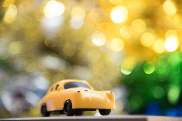 yellow car with bokeh background