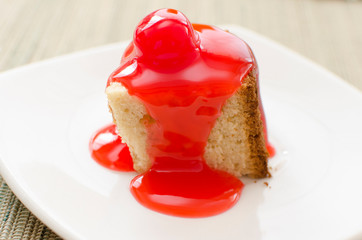 cake dessert and red fruit sauce
