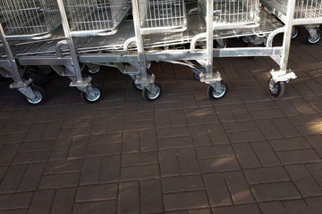 metal carts near the supermarket. wheels